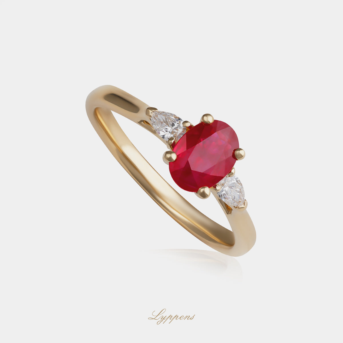 Yellow gold three-stone ring with ruby and diamonds