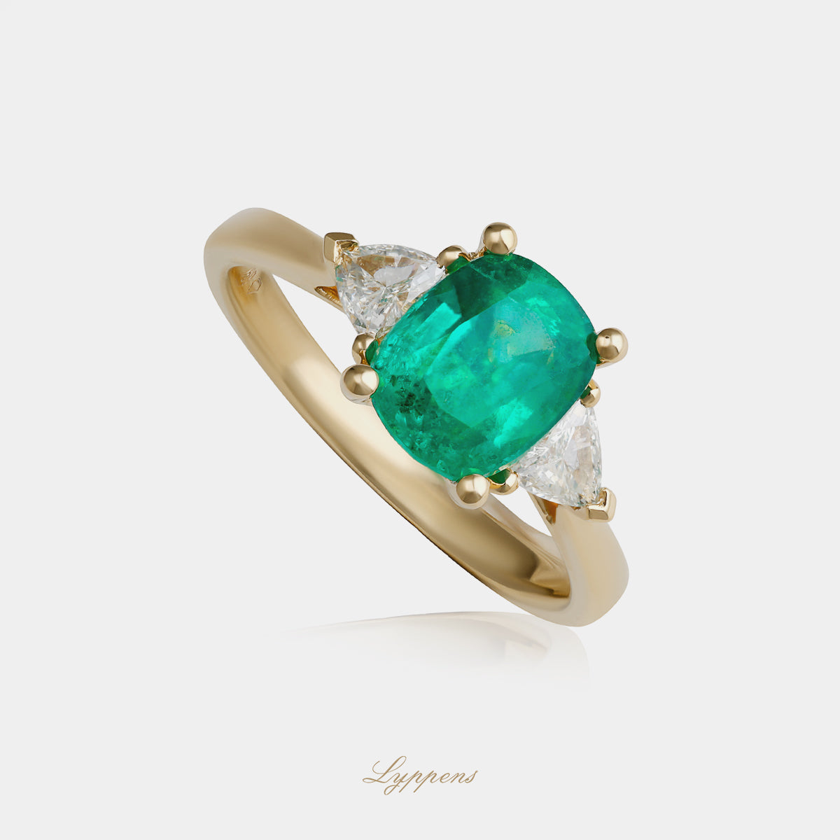 Geelgouden ring met smaragd en diamant