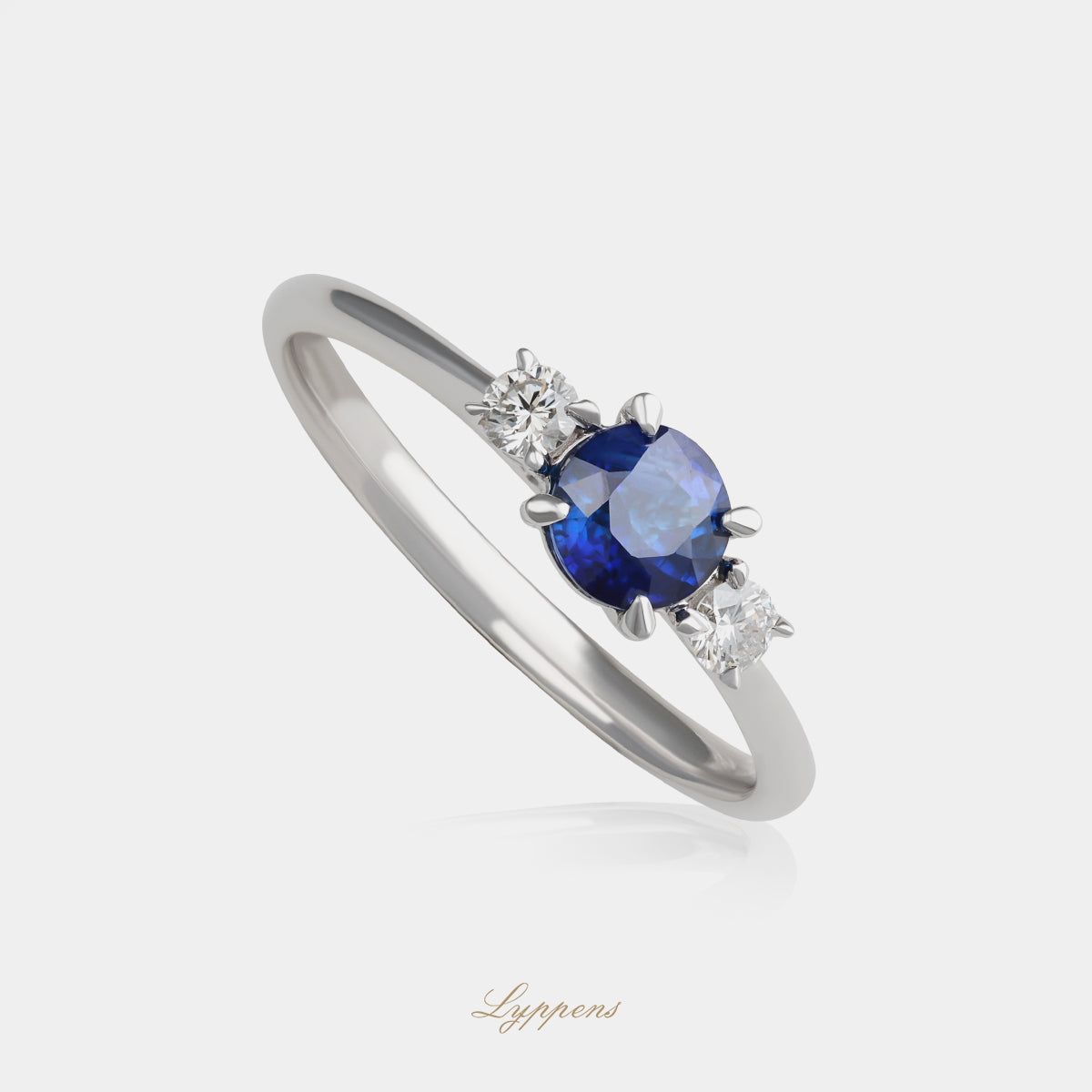 Witgouden ring met saffier en diamant