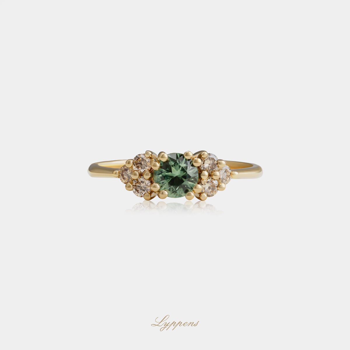 Geelgouden ring met groene saffier en bruine diamant