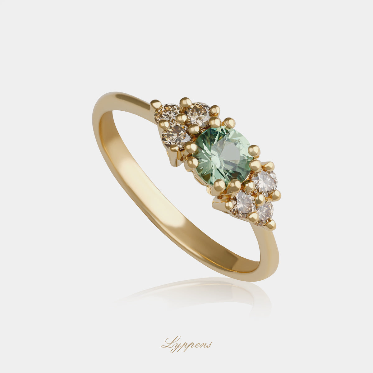 Geelgouden ring met groene saffier en bruine diamant