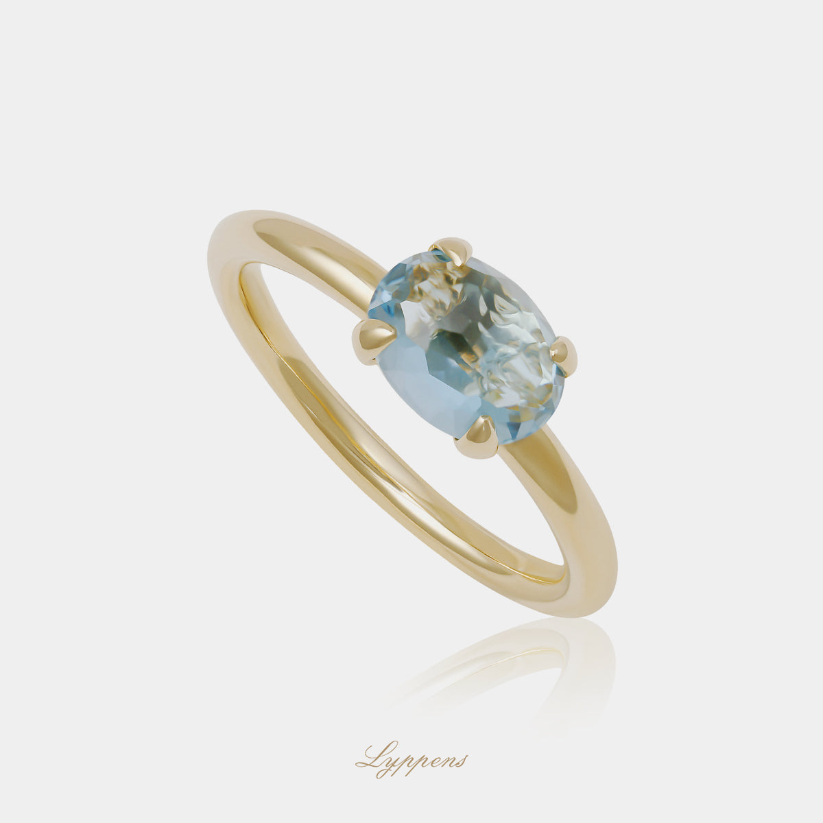 14 karaat geelgouden ring uit de Capri collectie met ovaal gefacetteerde Swiss Blue topaas, prachtig te combineren met andere ringen uit de collectie