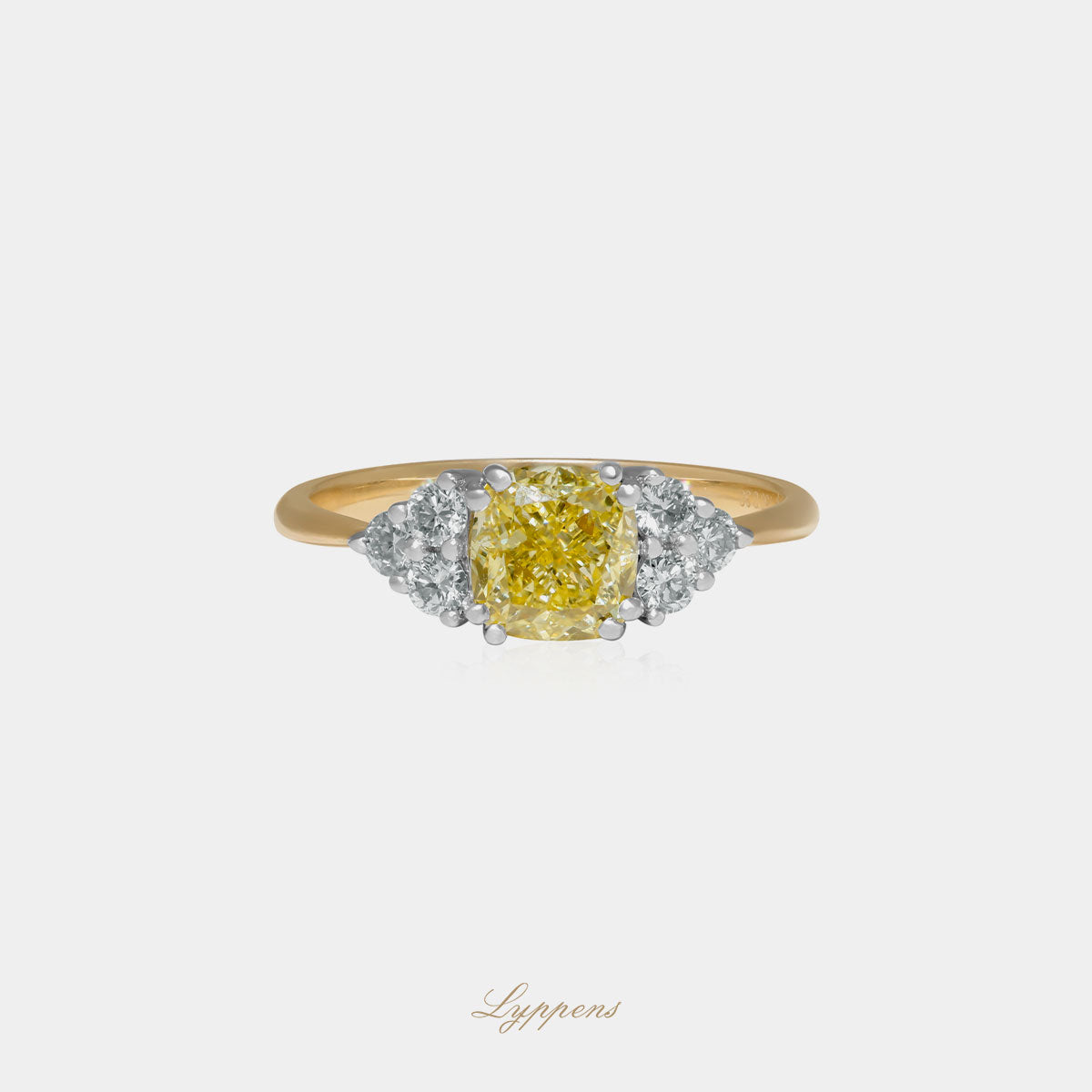 Yellow gold ring with fancy yellow and white diamonds