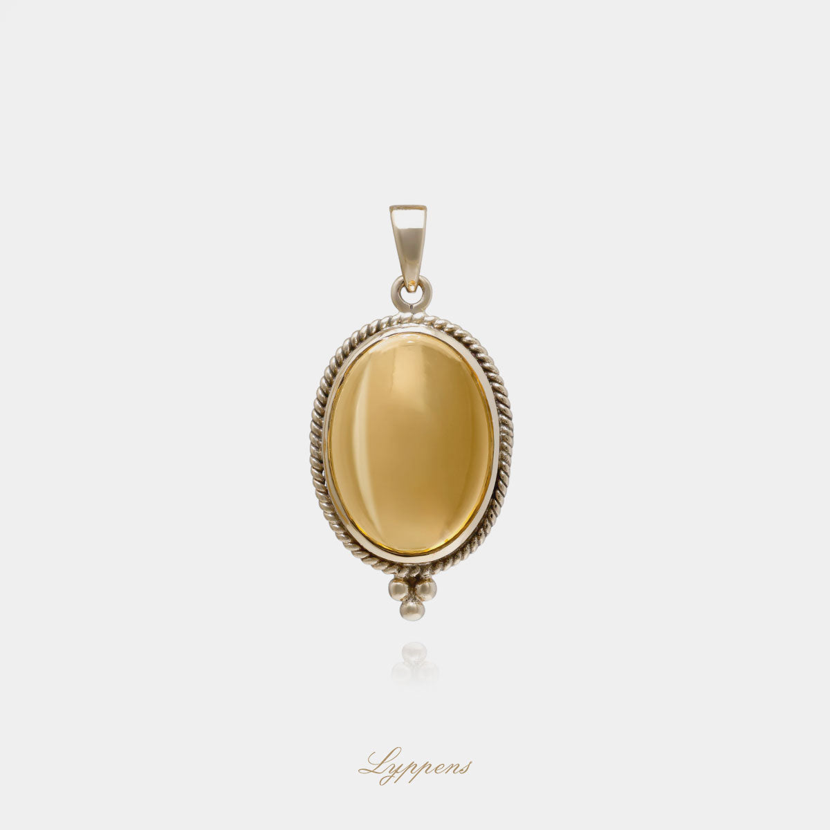 Geelgouden hanger gezet met cabochon geslepen citrien omlijst door een gedecoreerde tors randje