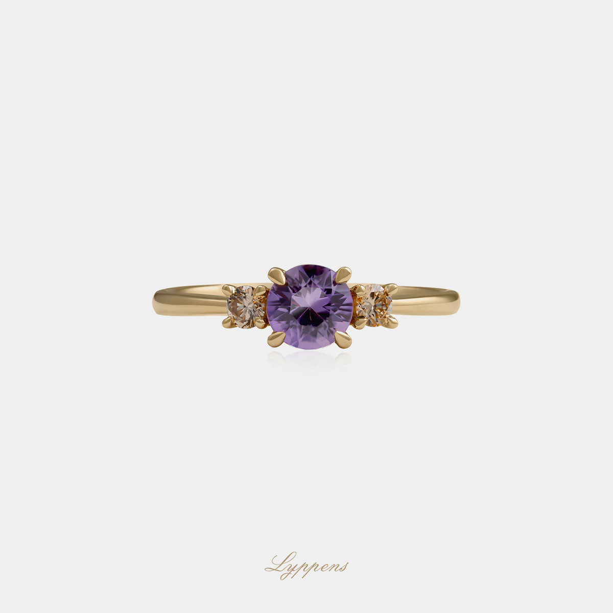 Geelgouden ring met paarse saffier en bruine diamant