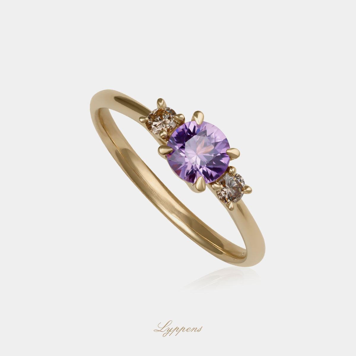 Geelgouden ring met paarse saffier en bruine diamant