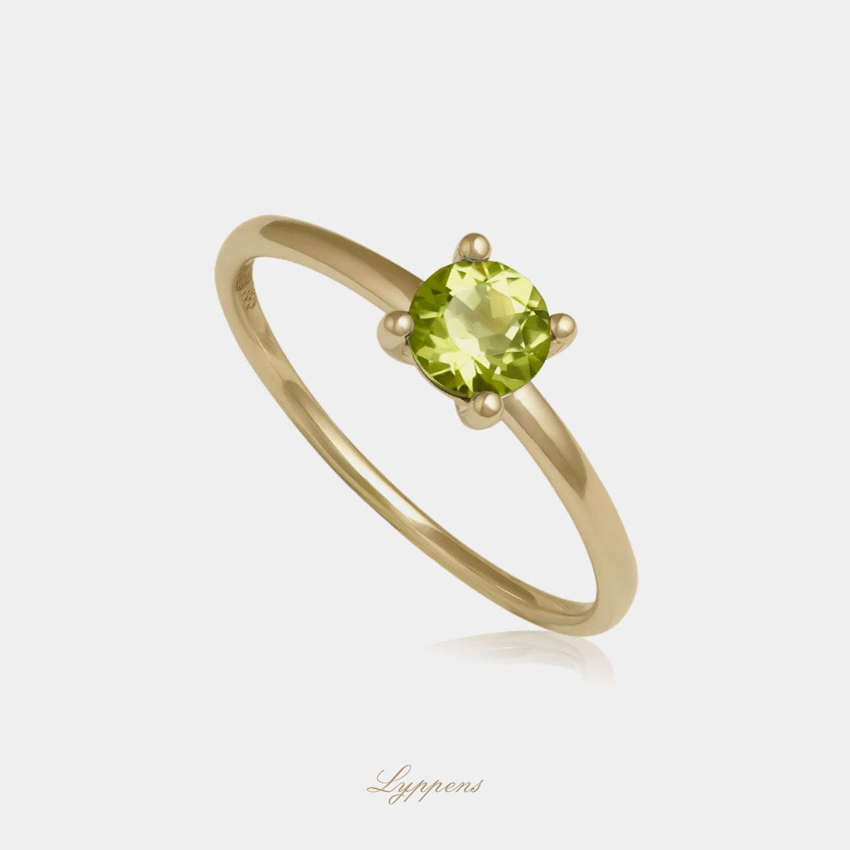 Yellow gold solitaire ring with peridot