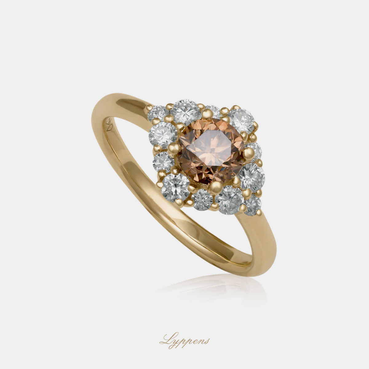 Geelgouden entourage ring met bruine en witte diamant