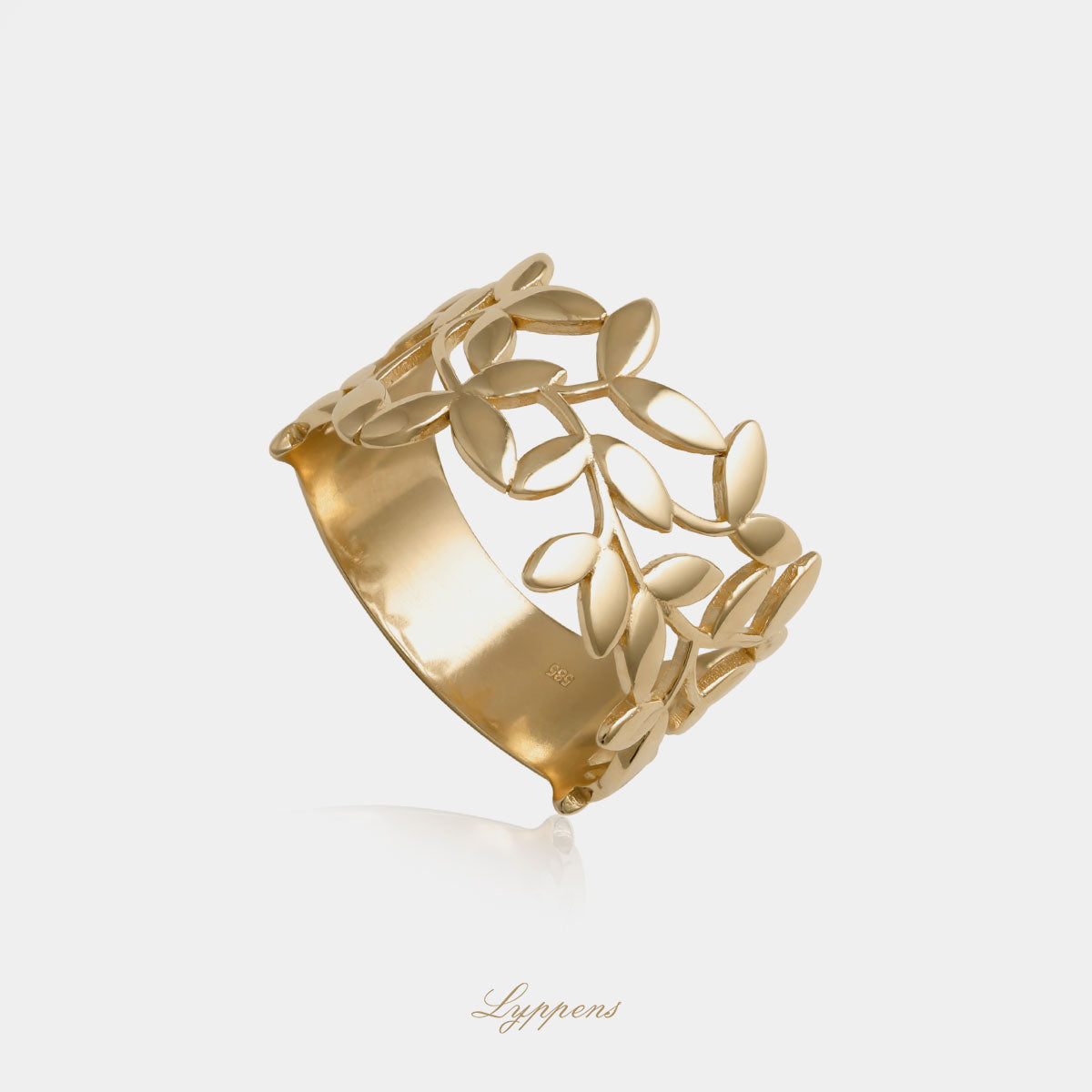 Yellow gold ring with olive branches