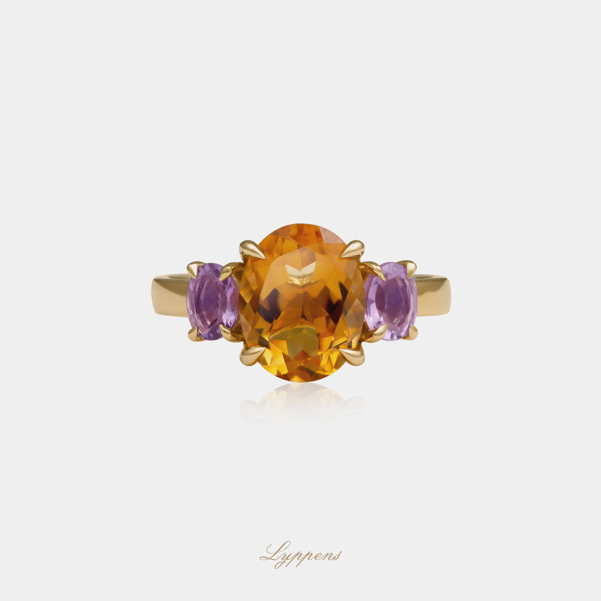 Yellow gold three stone ring with citrine and amethyst