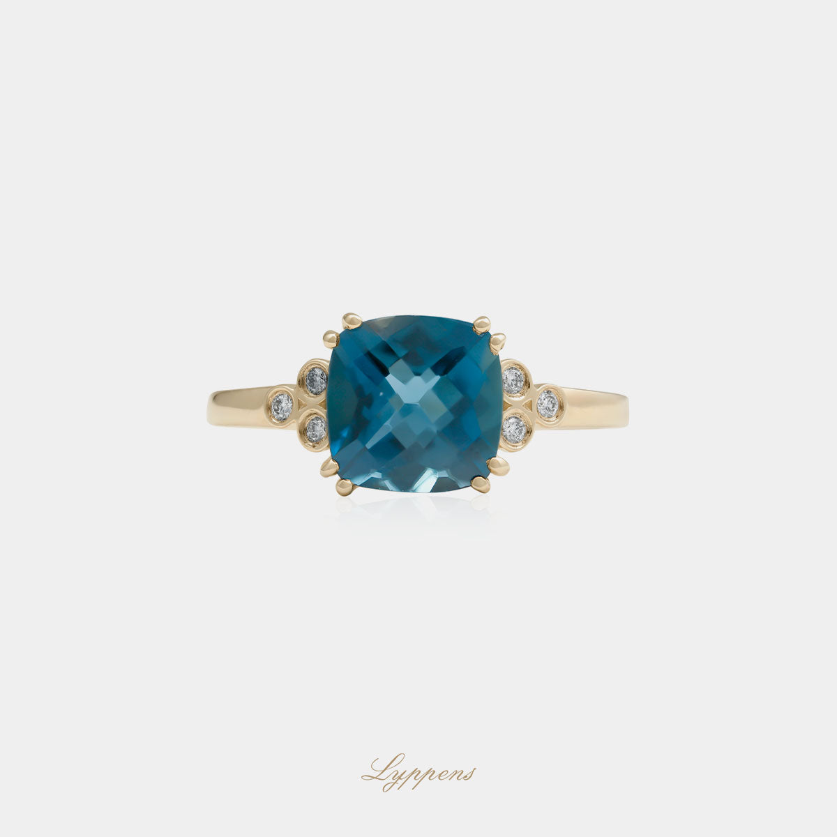 Yellow gold ring with topaz and diamonds