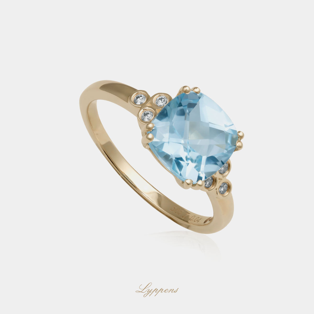 Yellow gold ring with topaz and diamonds