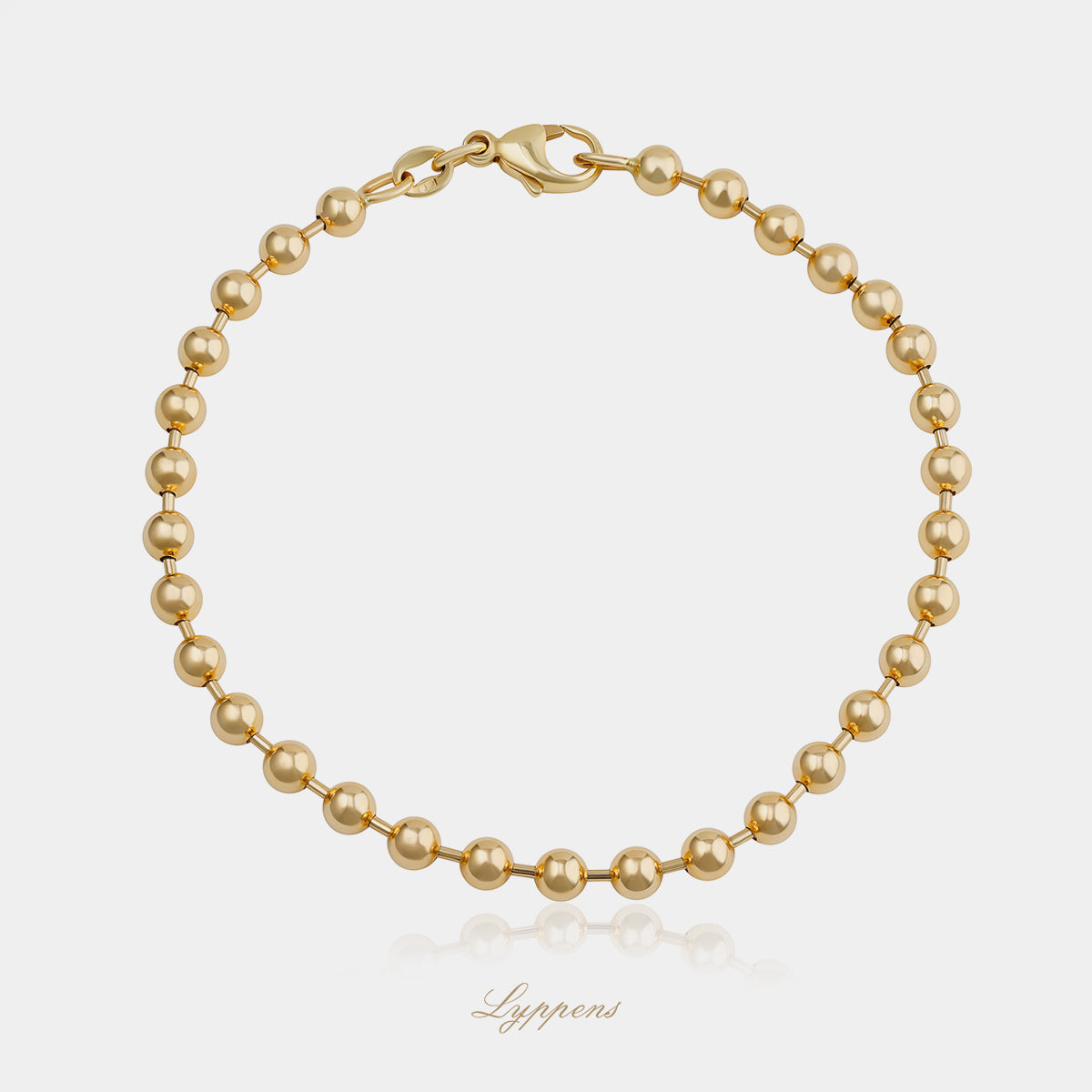 14kt geelgouden bolletjes armband met klassiek en tijdloos design