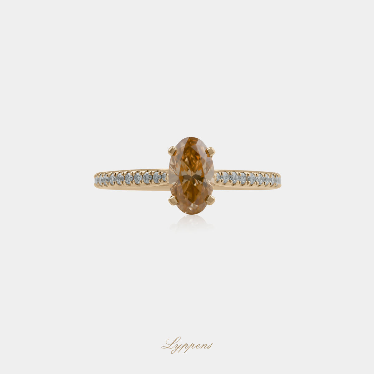 Geelgouden solitair ring met bruine en witte diamant