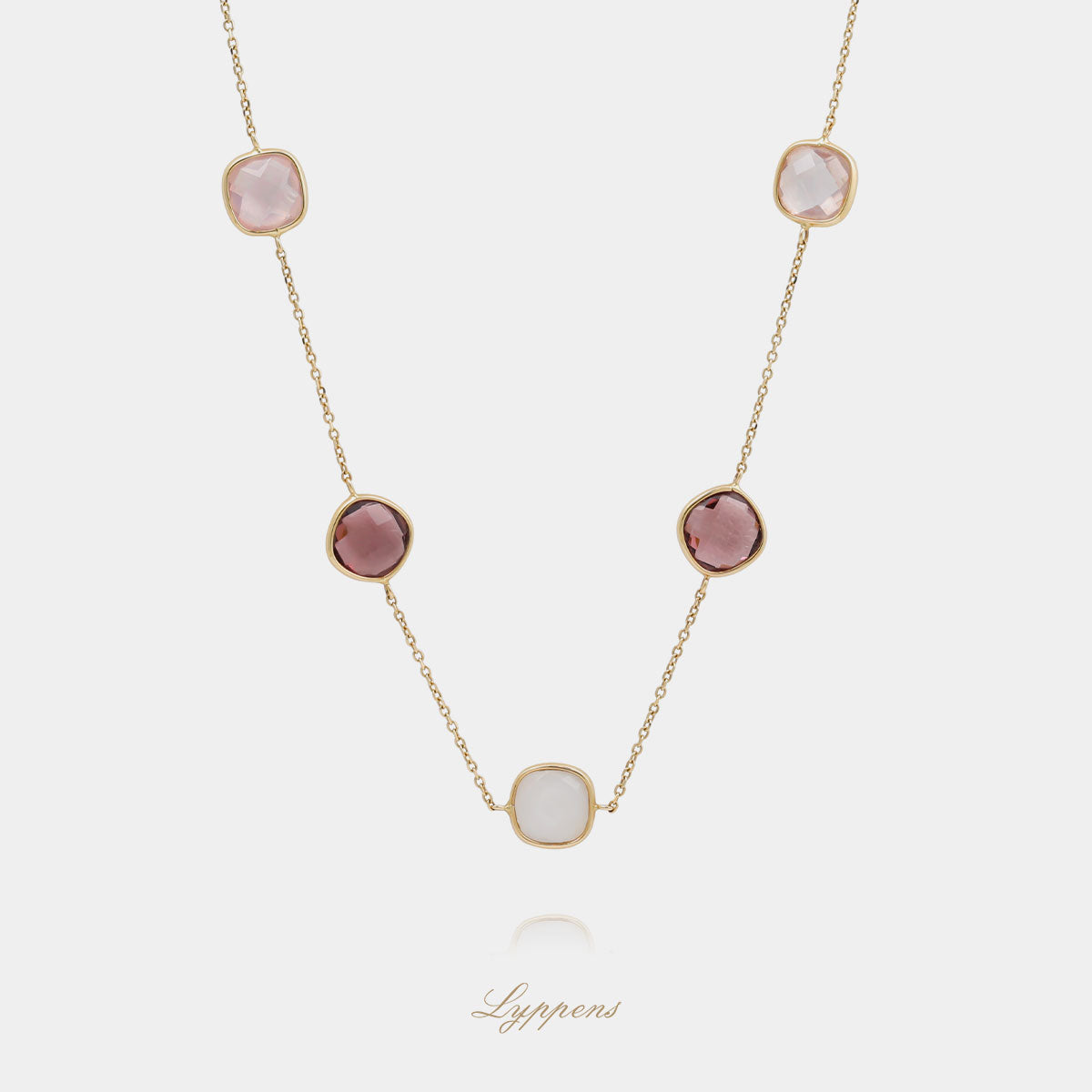 Yellow gold necklace with rose quartz, rhodolite and quartz