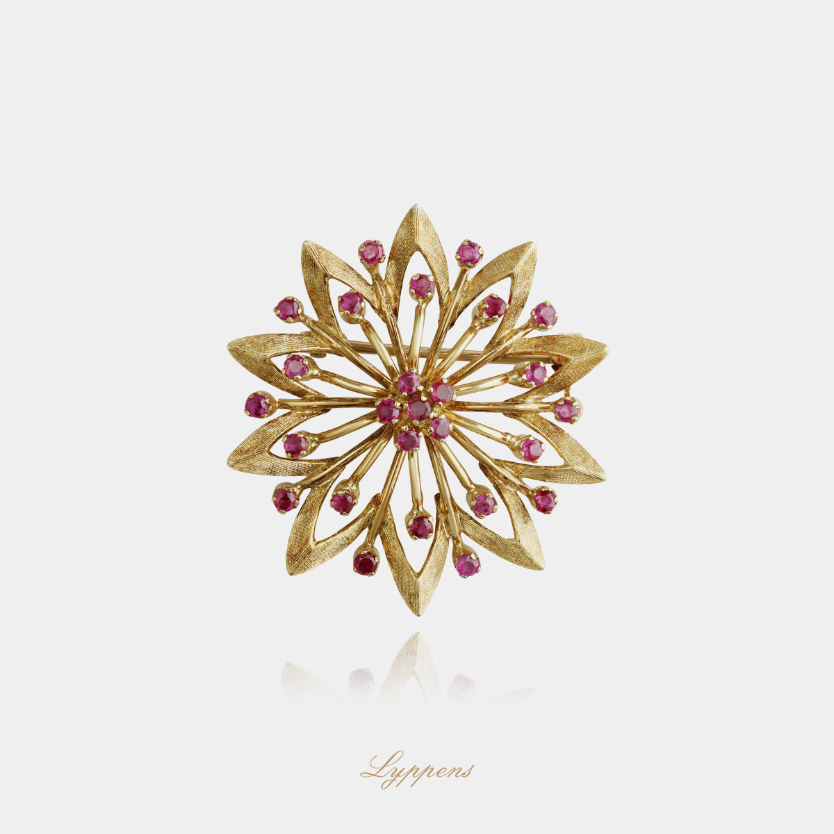 Geelgouden vintage jaren ’60 broche met robijn