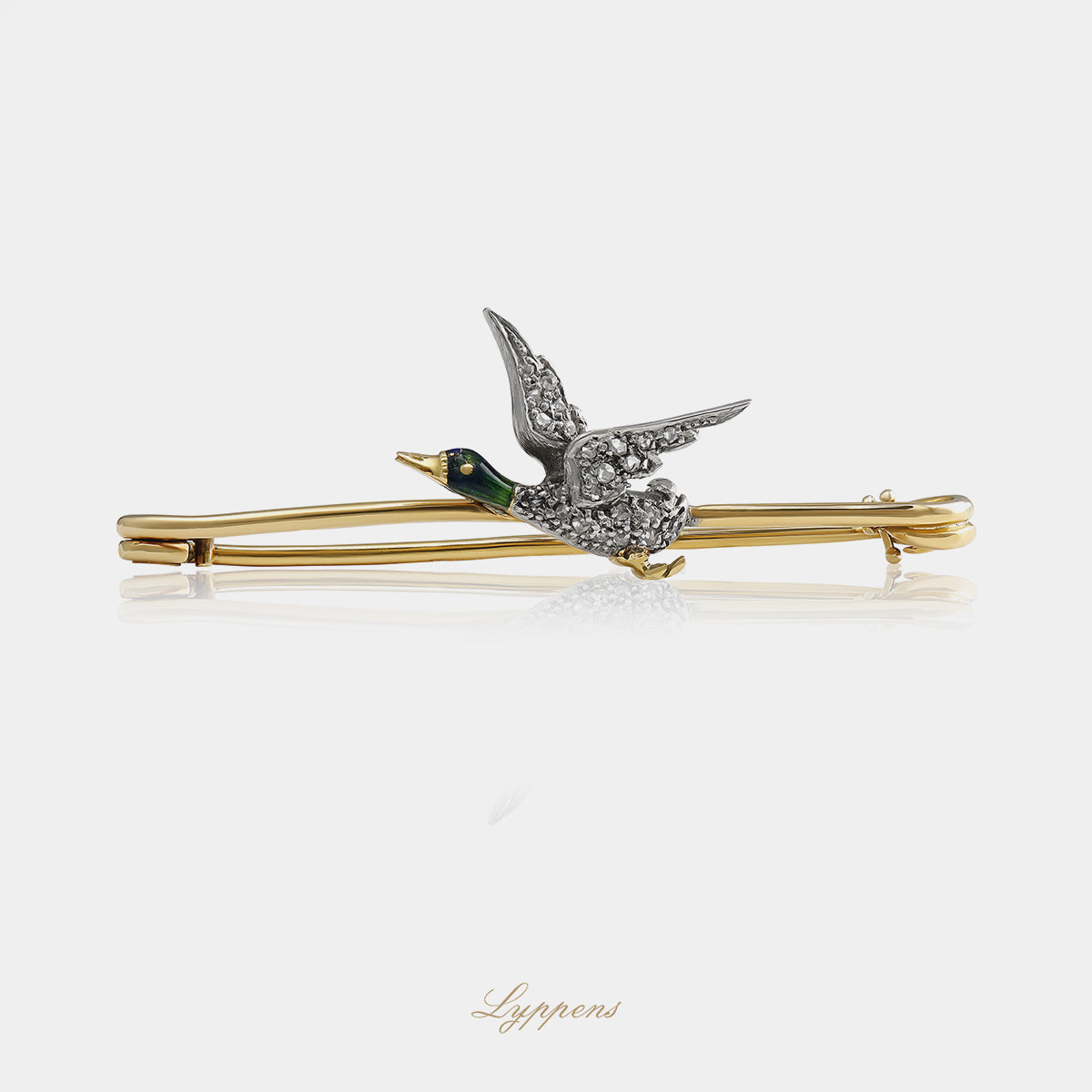 14kt geelgouden vintage broche in de vorm van een vliegende eend met groen emaille en achtkant geslepen diamant