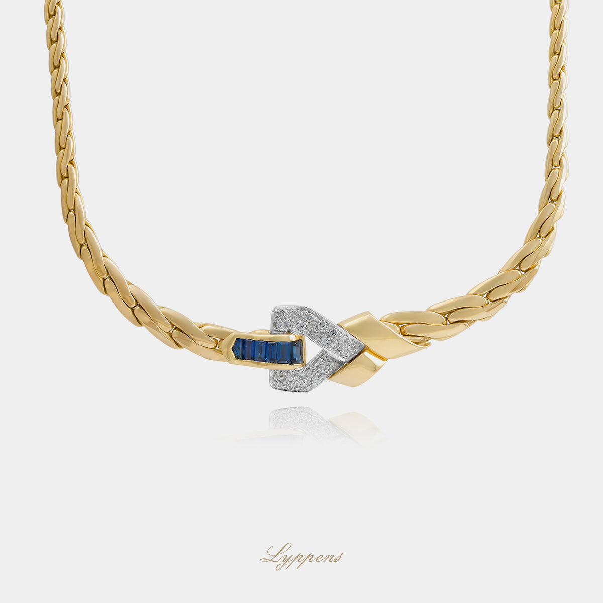 18kt geelgouden vintage jaren 50 schakelcollier met saffier en ca. 1.00ct briljant geslepen diamant