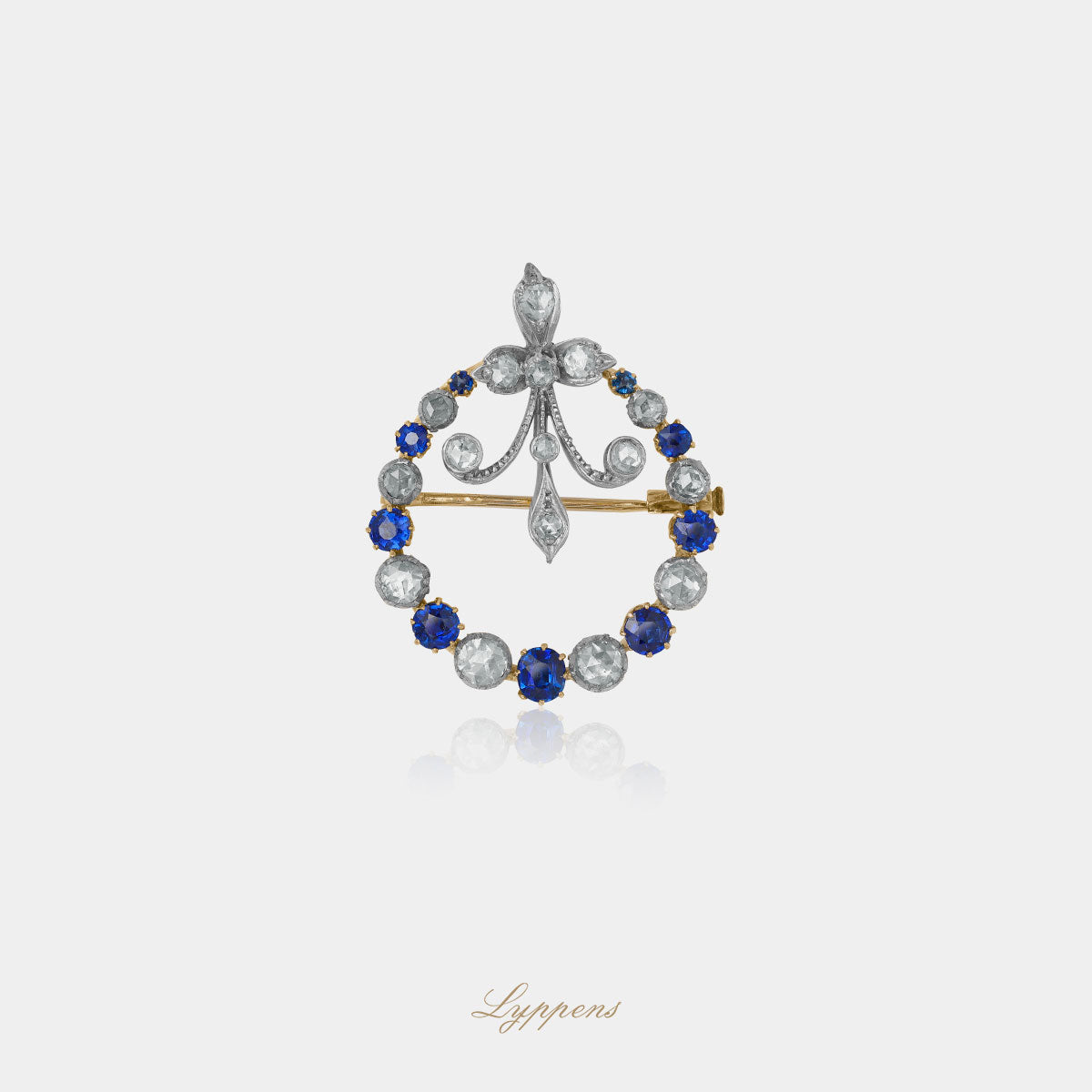 yellow gold vintage brooch with sapphire and diamonds