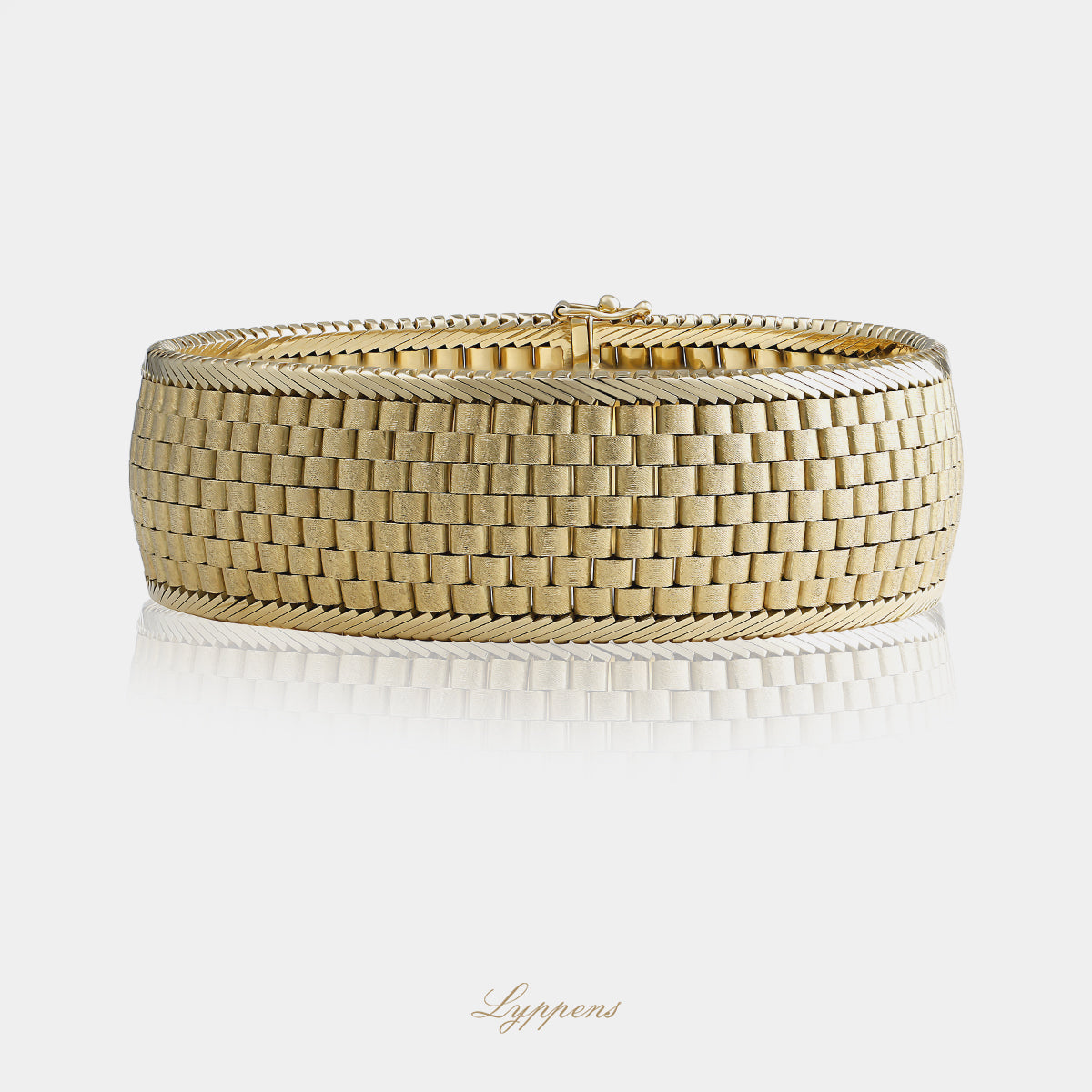 14kt geelgouden vintage schakelarmband met brede, soepel vallende schakels en een gematteerde afwerking met glanzende randen