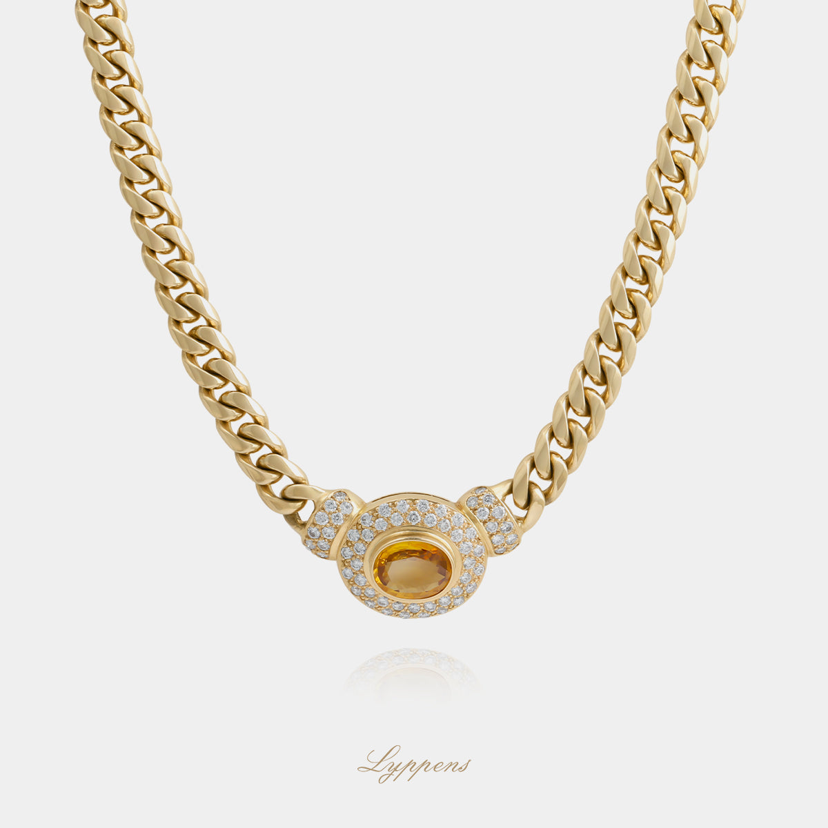 18kt geelgouden vintage gourmet schakelcollier met hanger, ovaal geslepen gele saffier en ca. 1.00ct diamant