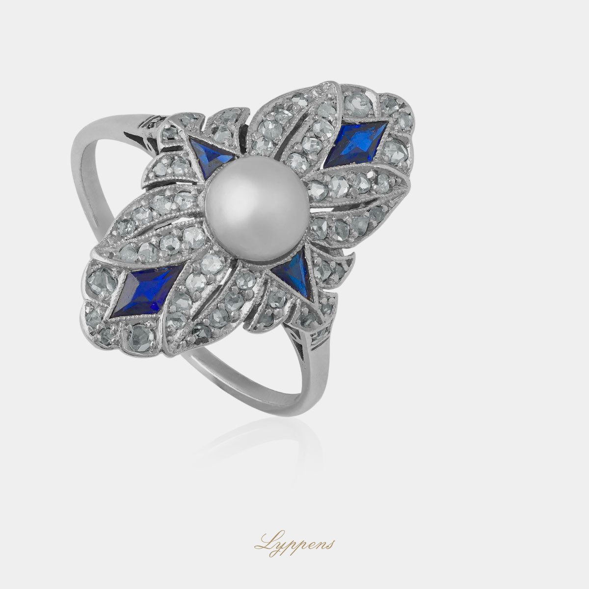 Witgouden en platina Art Deco ring met parel, saffier en diamant