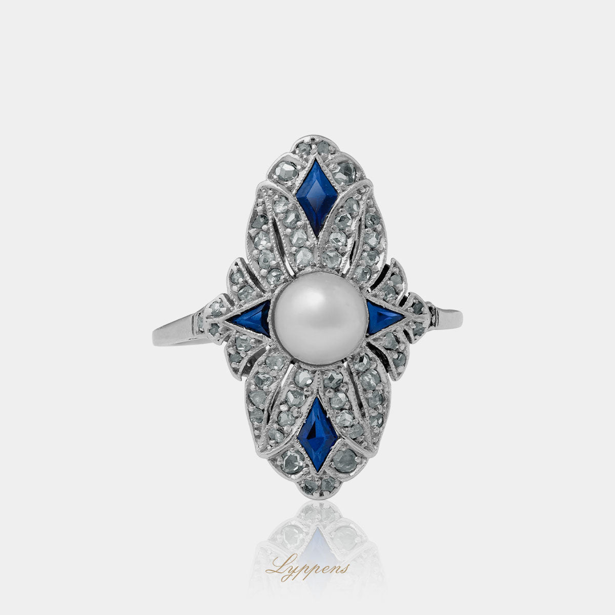 White gold and platinum Art Deco ring set with pearl, sapphire and diamonds