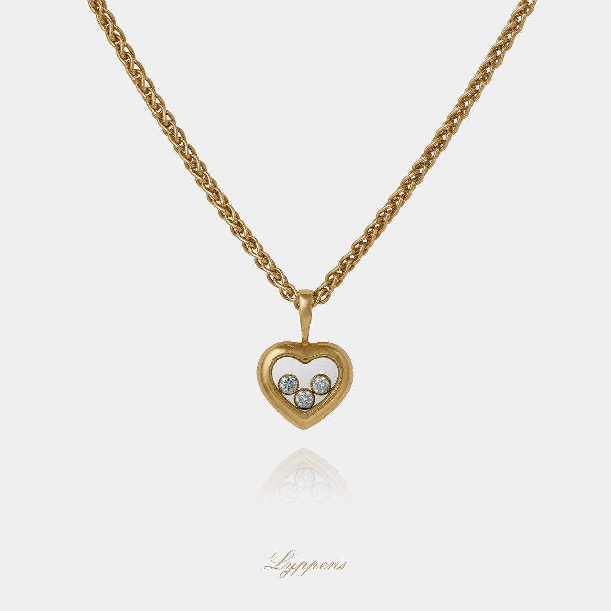 Yellow gold Chopard necklace with diamonds