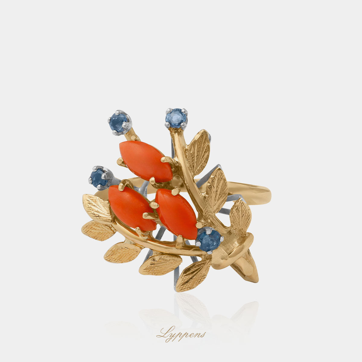 Geelgouden vintage jaren ‘70 ring met koraal en saffier