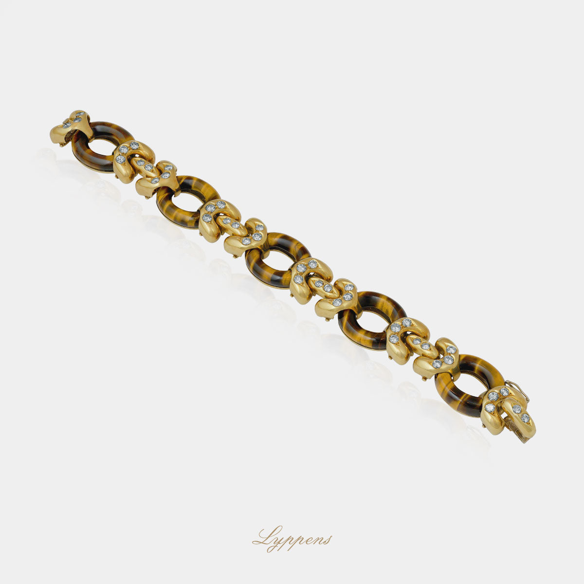 Yellow gold vintage 1970s bracelet with tiger eye and diamonds
