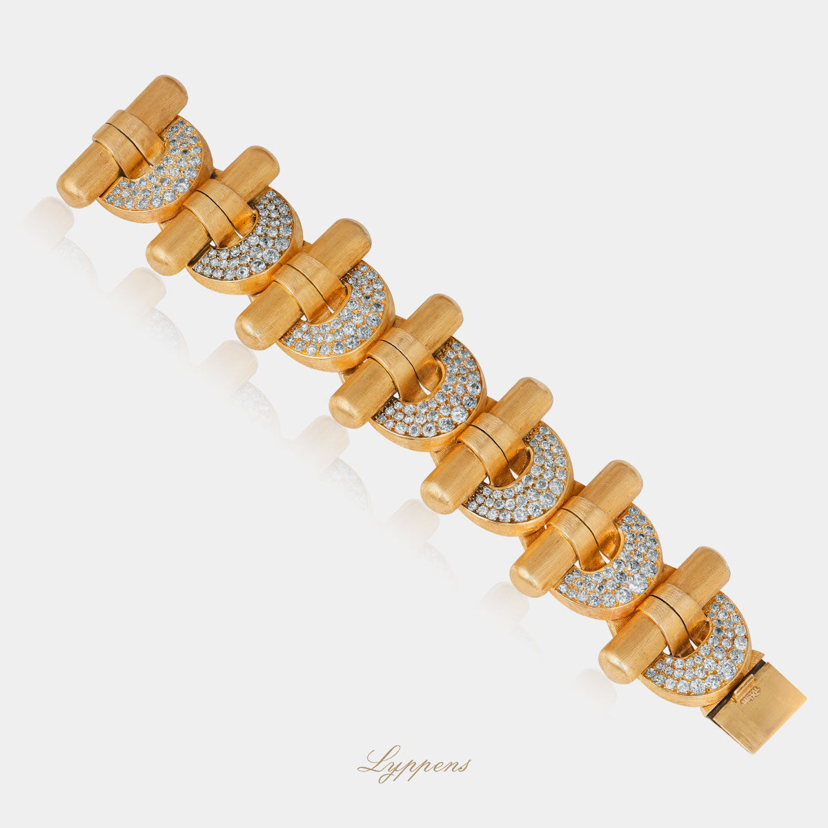 Geelgouden vintage jaren ‘50 schakelarmband met diamant