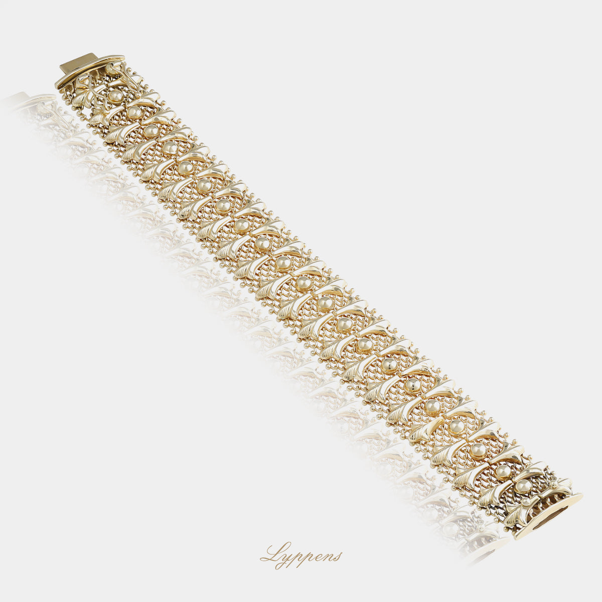 Vintage armband uit de jaren ’60 van 14kt geelgoud met opengewerkte Franse lelies en verfijnde gevlochten verbindingen