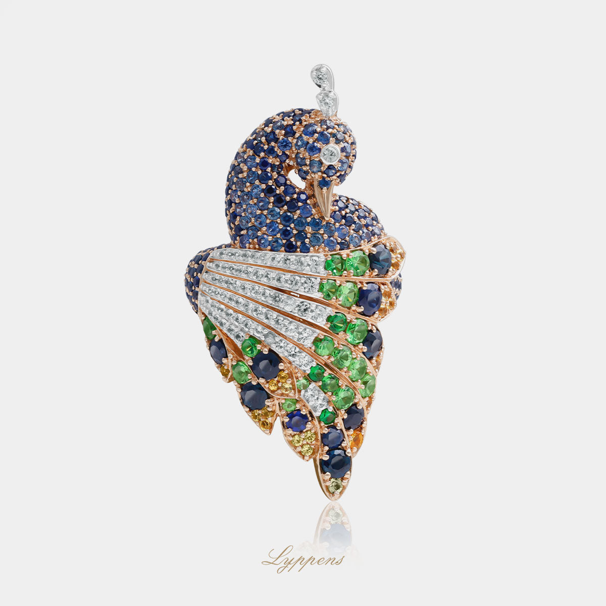 Peacock ring tsavorite and sapphire