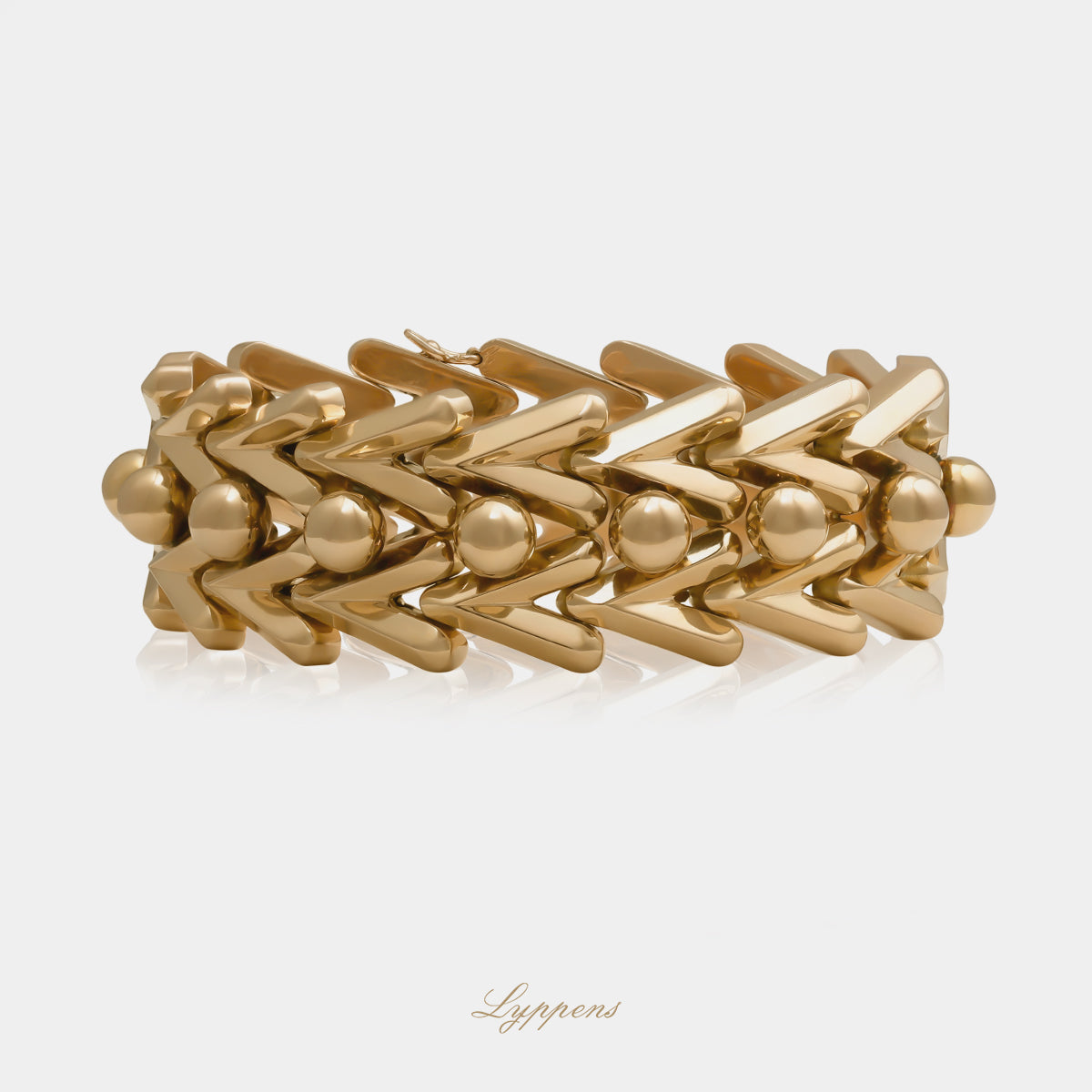 18kt roségouden vintage jaren '50 schakelarmband opgebouwd uit V vormige schakels 