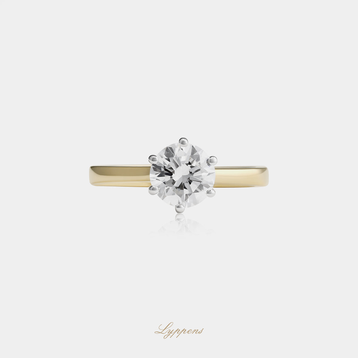Yellow gold solitaire ring with diamond