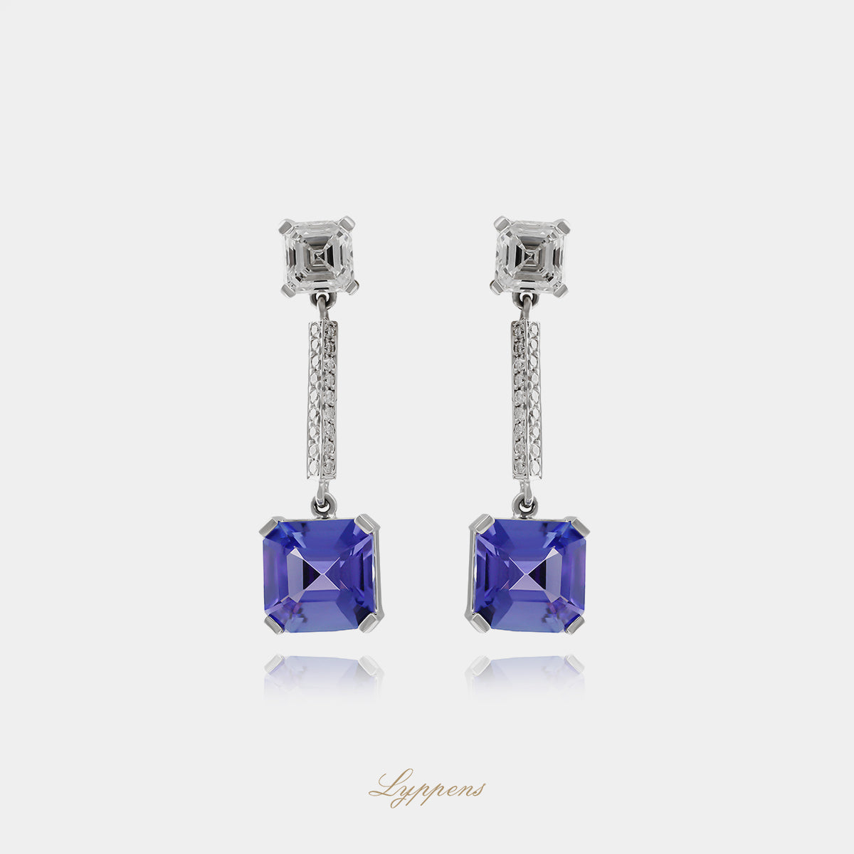 White gold stud earrings with tanzanite and diamonds