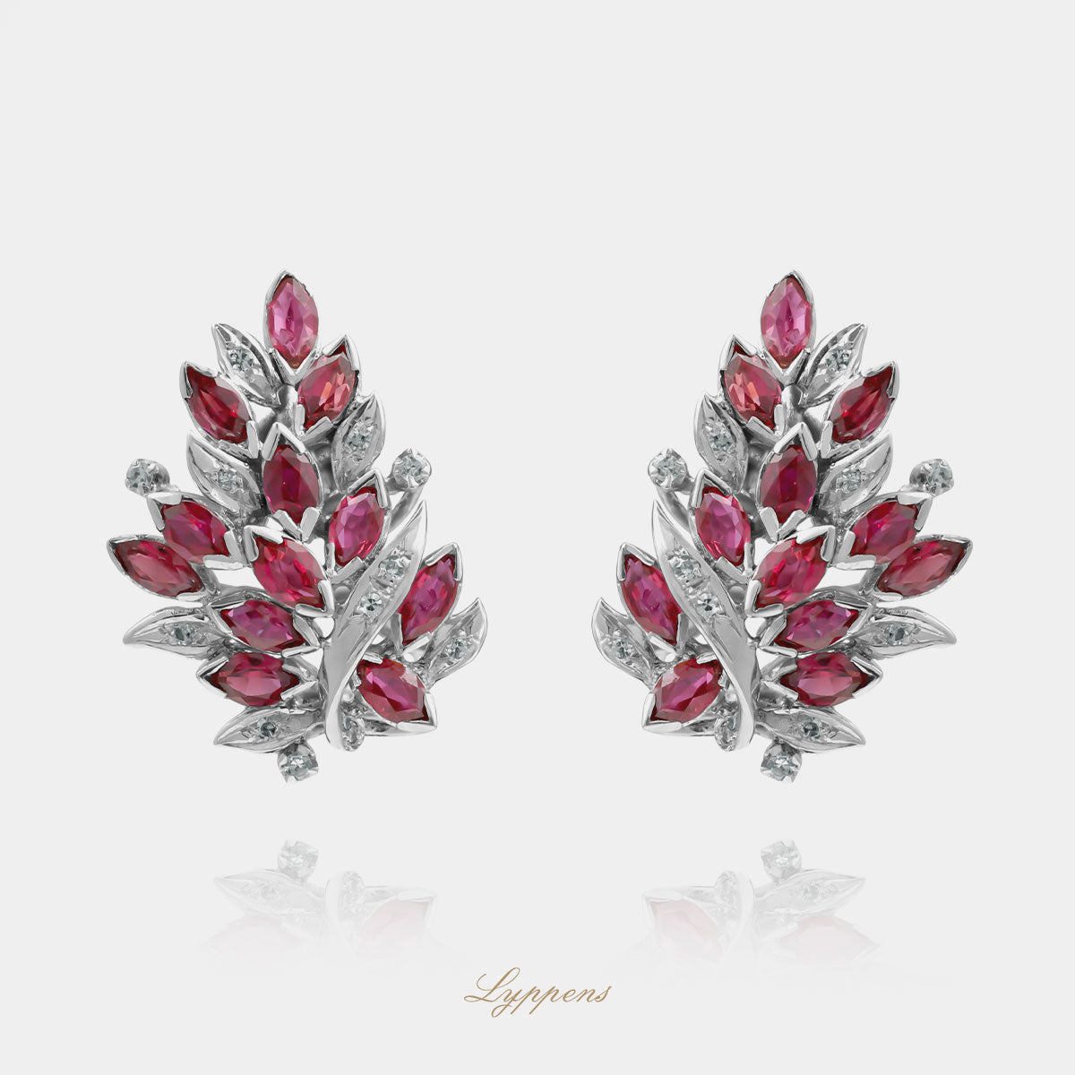 White gold vintage 1960s-70s earrings with ruby and diamonds
