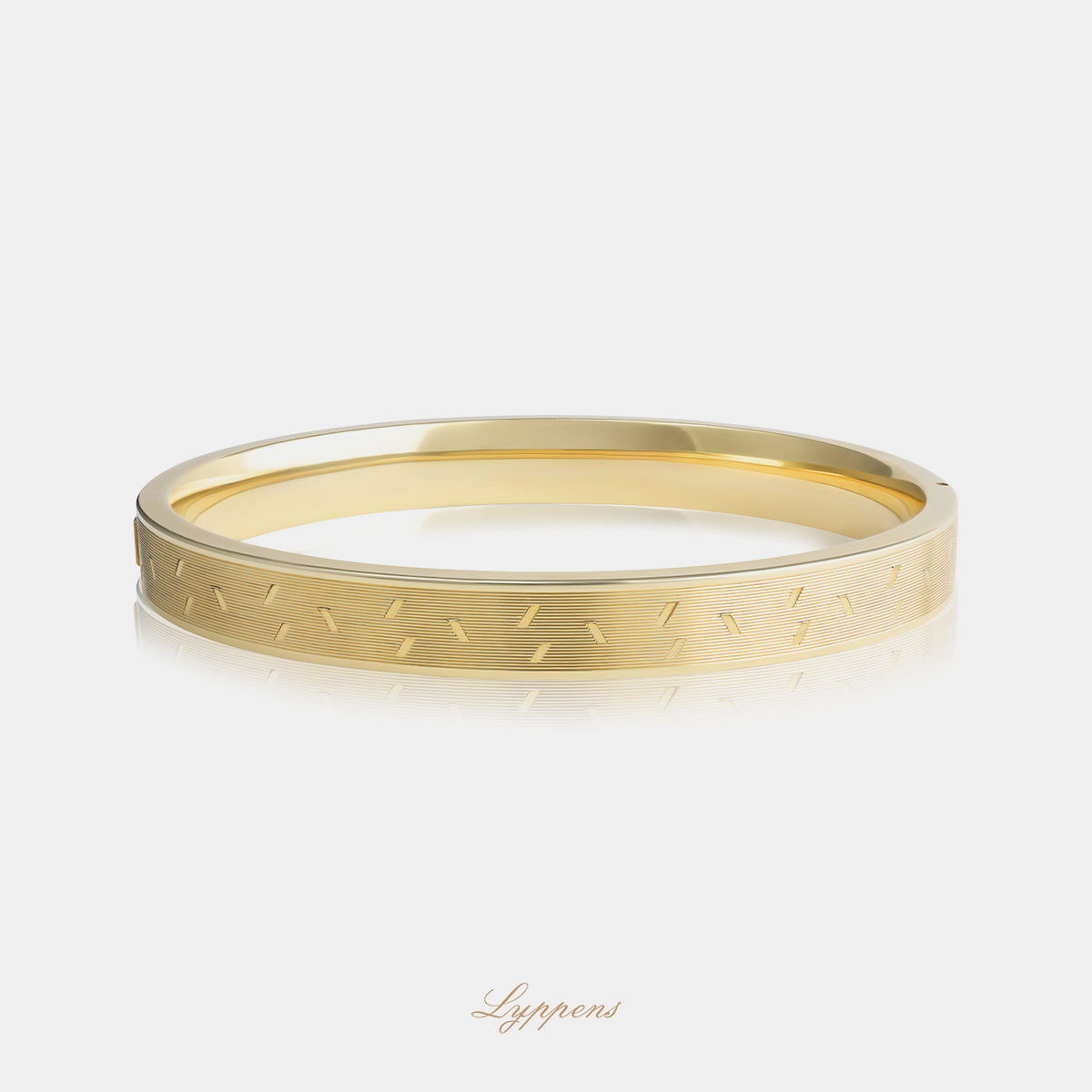 Vintage bangle van 14kt geelgoud met ovale vorm, rechthoekig profiel en verfijnde gravures