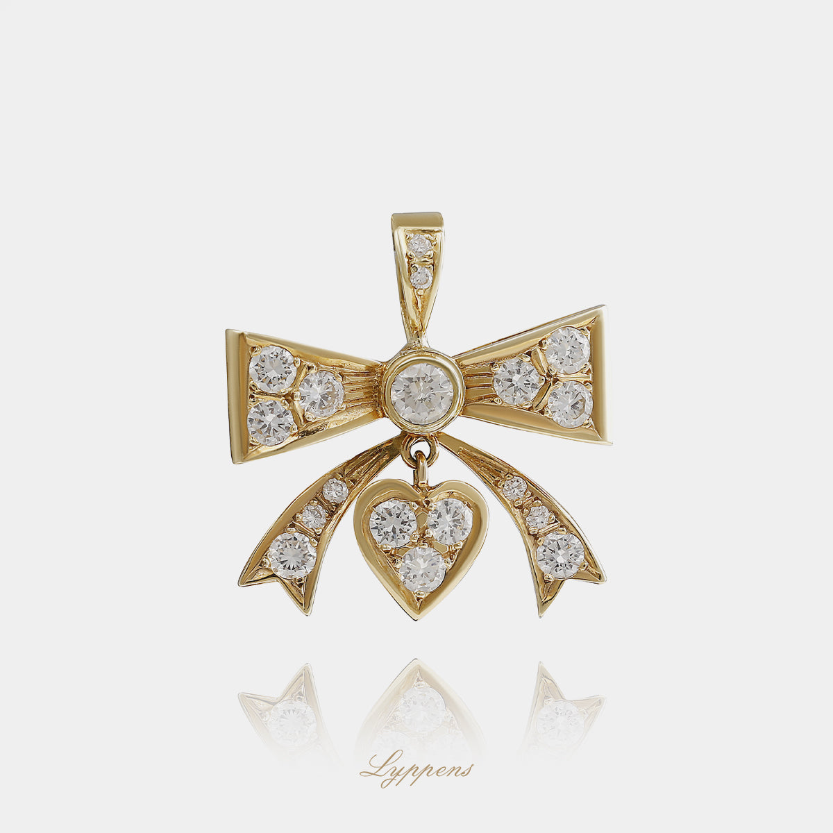 14kt geelgouden vintage strikhanger gezet met briljant geslepen diamant met een totaalgewicht van ca. 1.10ct H VS