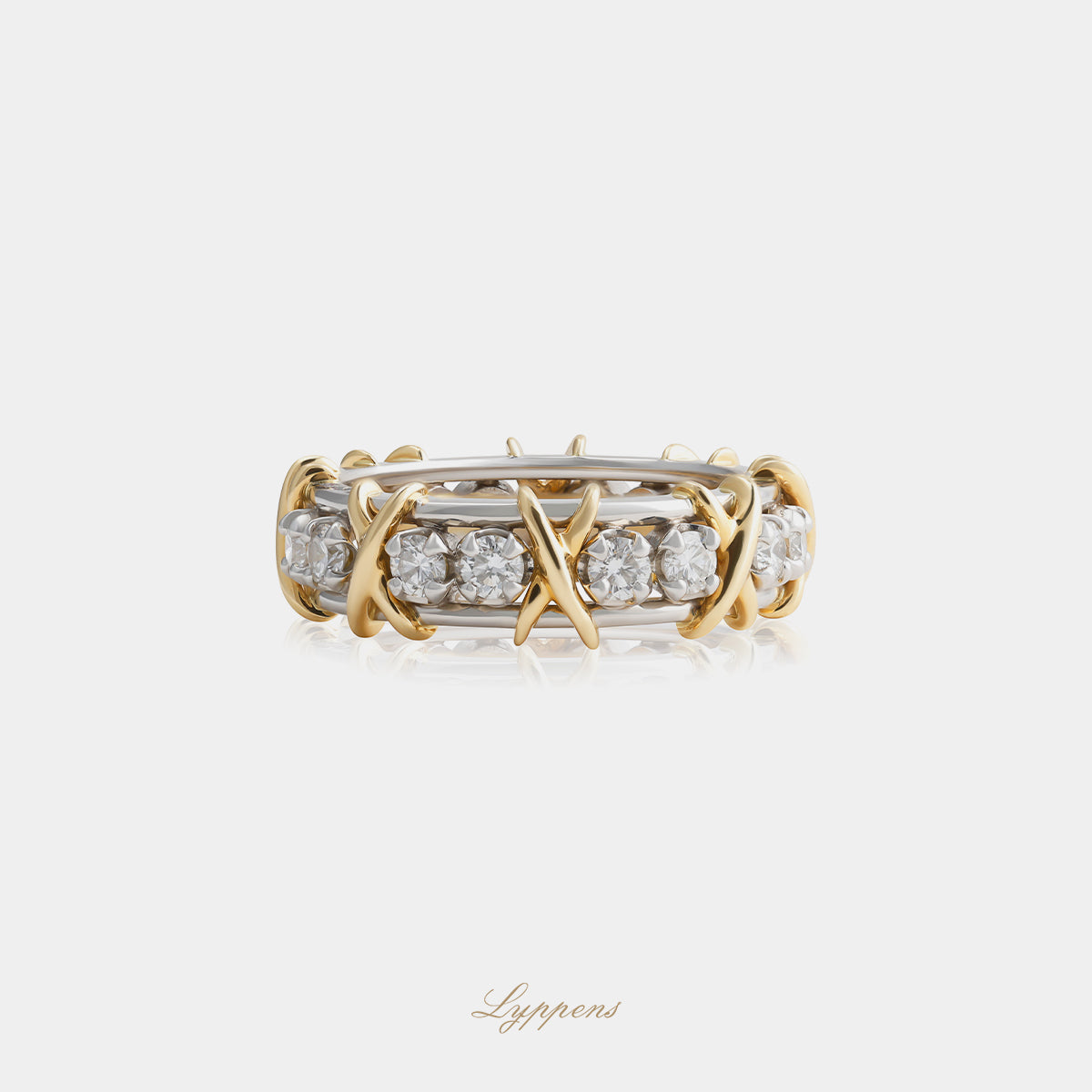 Geelgouden met platina alliance ring van Tiffany & Co. met diamant