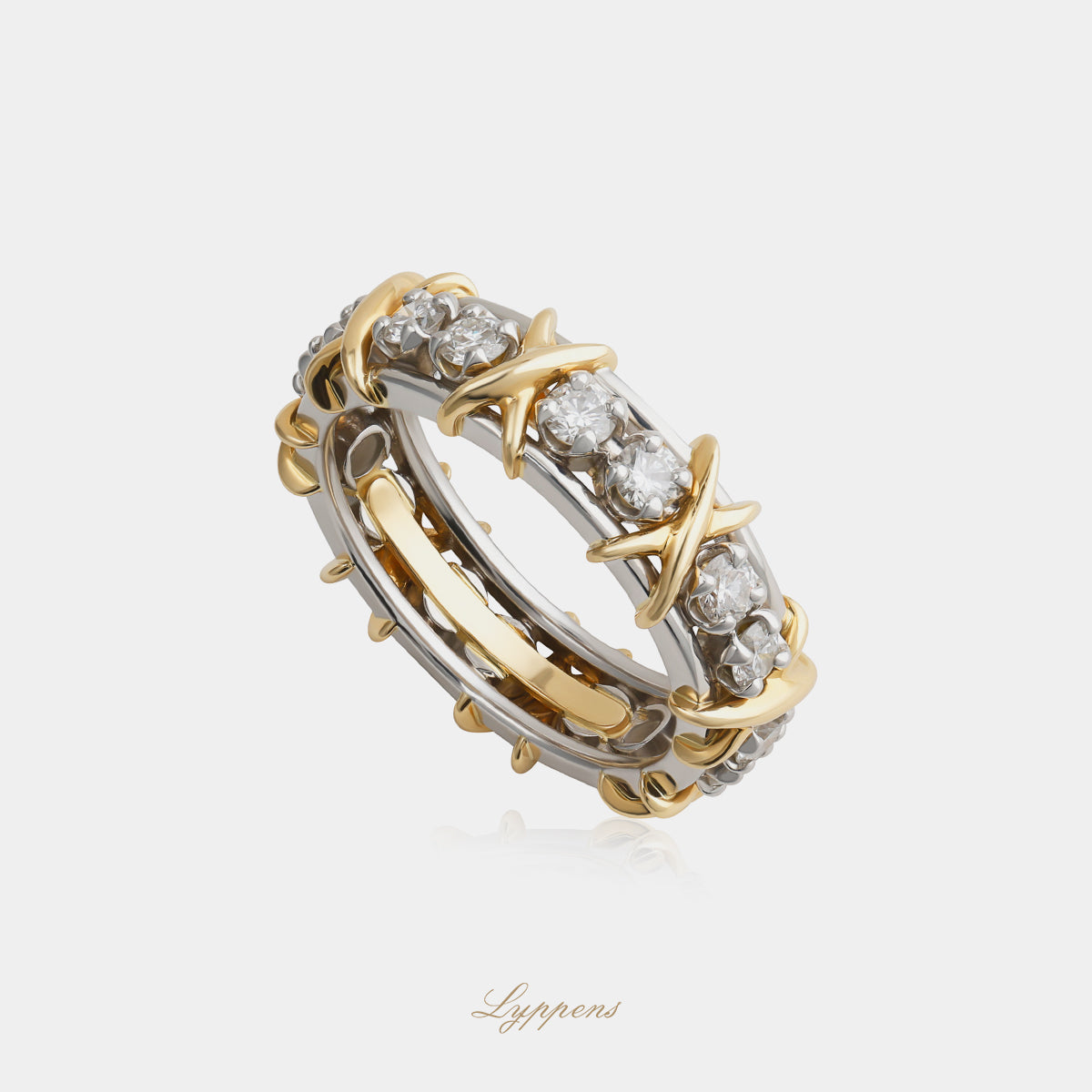 Geelgouden met platina alliance ring van Tiffany & Co. met diamant