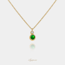 Geelgoud met tsavoriet en diamant