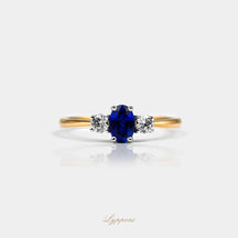 Geelgoud met saffier en diamant