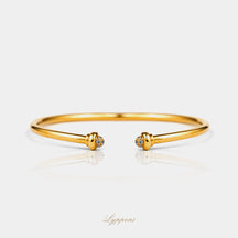 Geelgoud met diamant