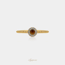 Geelgoud met tijgeroog en diamant