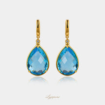 Geelgoud met topaas en diamant