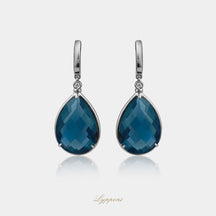 Witgoud met topaas en diamant
