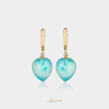 Geelgoud met larimar en diamant