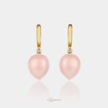 Geelgoud met roze chalcedoon en diamant