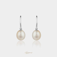 Witgoud met parel en diamant